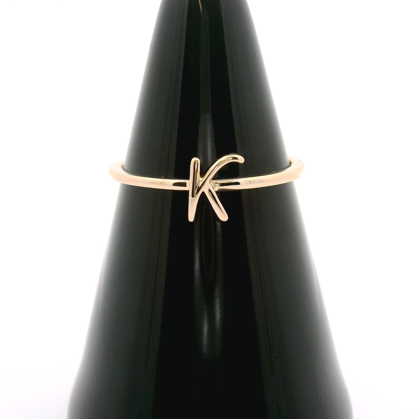 10k yellow gold script "K" ring.